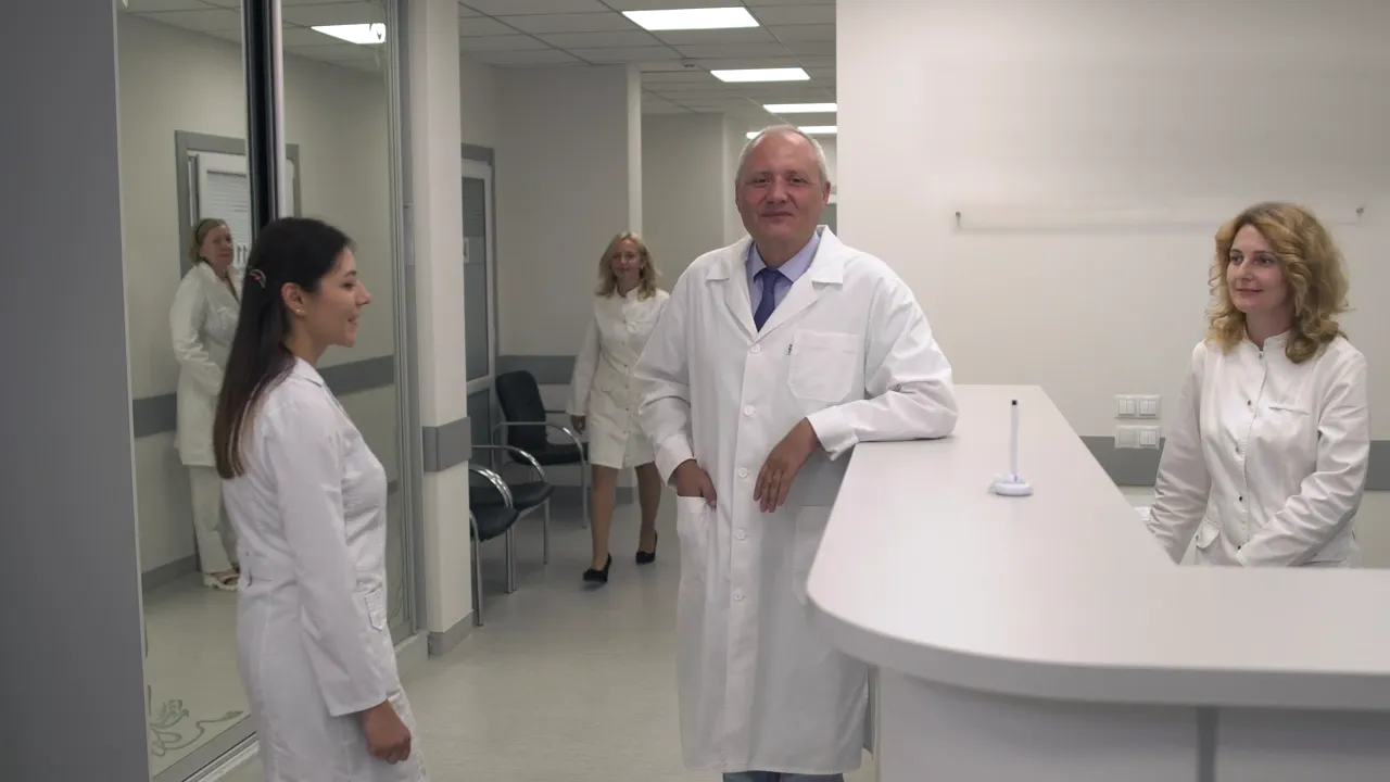 A patient talking with a doctor during a visit