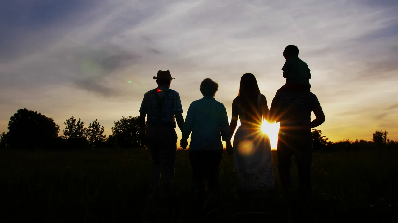 A family together outdoors in an American small town